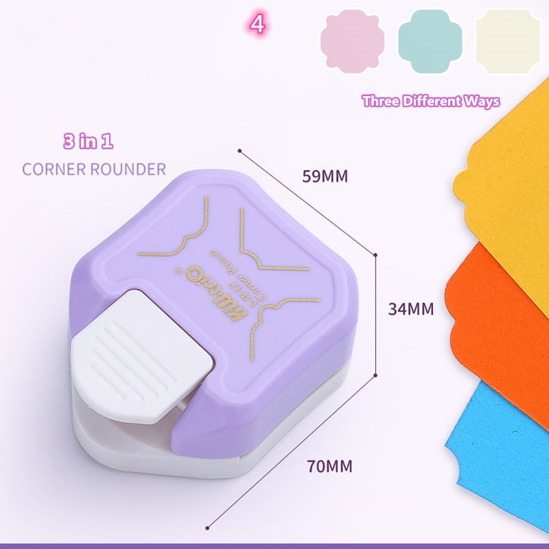 May include: Purple 3 in 1 corner rounder with a white lever. The rounder is 7 cm wide, 5.9 cm tall, and 3.4 cm deep. It can create three different corner shapes.