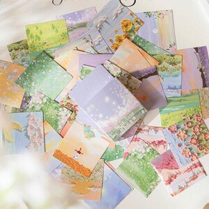 May include: A set of colorful, pastel-toned square stickers featuring various nature scenes. The stickers are in a purple box with the text "Think Love" and Chinese characters.