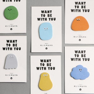 May include: Set of six colorful sticky notes with different cartoon characters and the text "Want to be with you".