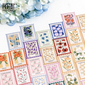 May include: A set of 20 colorful stickers featuring various flowers and the text "FLOWER MARKET" with the city name below. The stickers are designed to look like postage stamps with a scalloped edge.