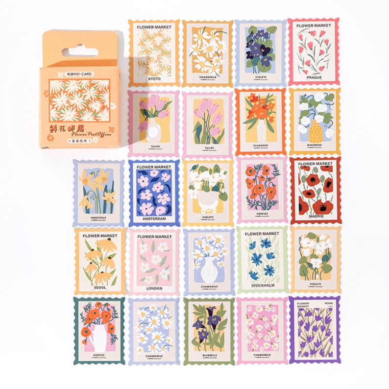 May include: A set of 20 colorful flower stickers with a vintage postage stamp design. Each sticker features a different type of flower and the name of a city. The stickers are perfect for adding a touch of whimsy to journals, planners, and other paper crafts.