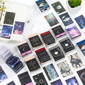 50 pcs, autocollants étoiles, autocollants lune, autocollants galaxie, autocollants cosmiques, planète, univers, coloré, ciel, autocollants mignons, nuit étoilée, journal