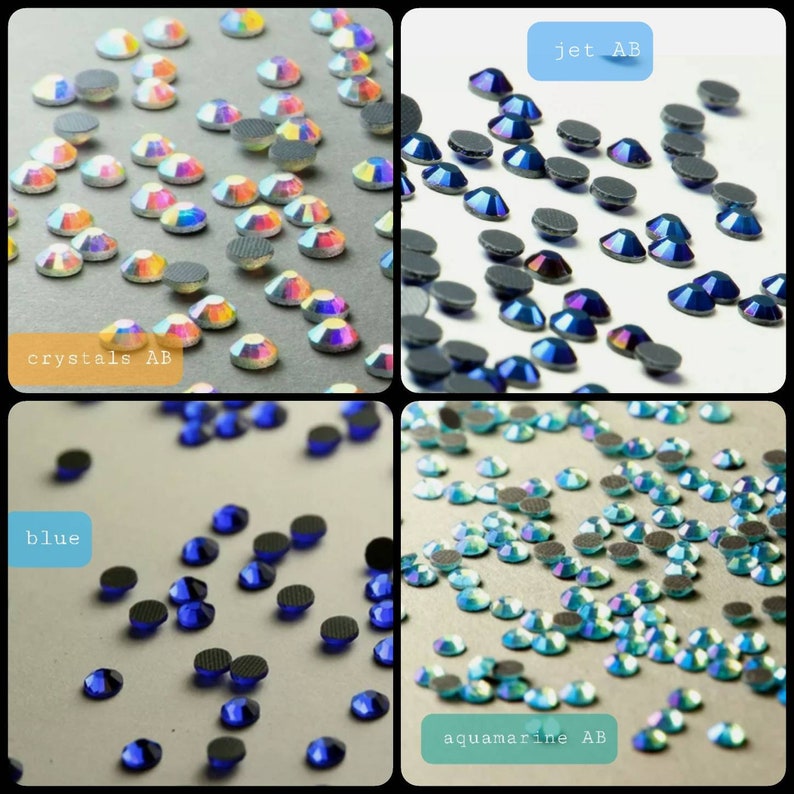Puede incluir: Surtido de piedras de cristal en varios colores, incluyendo cristales AB, jet AB, azul y aguamarina AB. Las piedras de cristal est&aacute;n dispuestas en cuatro grupos separados, cada uno con una etiqueta que indica el color.