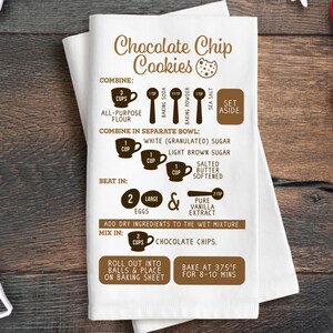 May include: A white kitchen towel with brown text and illustrations showing the ingredients and instructions for making chocolate chip cookies. The text includes measurements in cups and teaspoons. The text reads "Chocolate Chip Cookies", "Combine", "Combine in Separate Bowl", "Beat In", "Add dry ingredients to the wet mixture", "Mix In", "Roll out into balls & place on baking sheet", and "Bake at 375&deg;F for 8-10 mins".