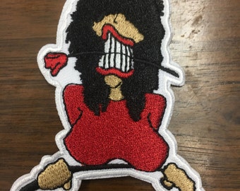 Signora con toppa rosa