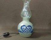 Rowe Pottery Works portable lamp, with glass globe. Salt glazed pottery.