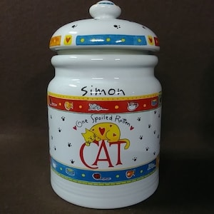 Vintage ceramic cat, treat, cookie jar, with plastic seal lid.