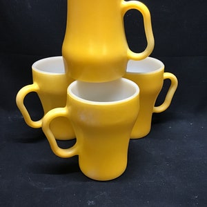 Set of 4 vintage Fire King mugs. Orange Milk Glass
