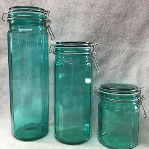 Vintage green glass canisters jars Wire closure, rubber seal. Set of 3