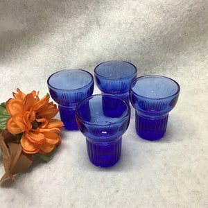 Vintage cobalt blue shot glasses  2 ounce capacity