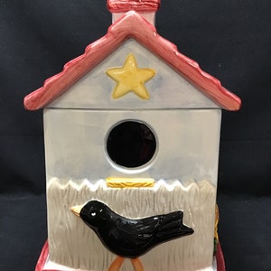 Vintage ceramic “Bird House” cookie jar.