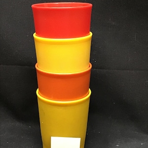 Set of 4 vintage Tupperware tumblers. Multi color. 6 ounce capacity
