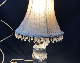 Vintage  Porcelain Victorian Lamp. Lady with parasol. Cloth Beaded Tassel Shade