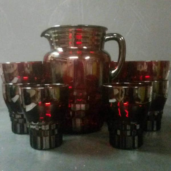 Vintage ruby red pitcher and 4 matching glasses, or a set of 6 glasses