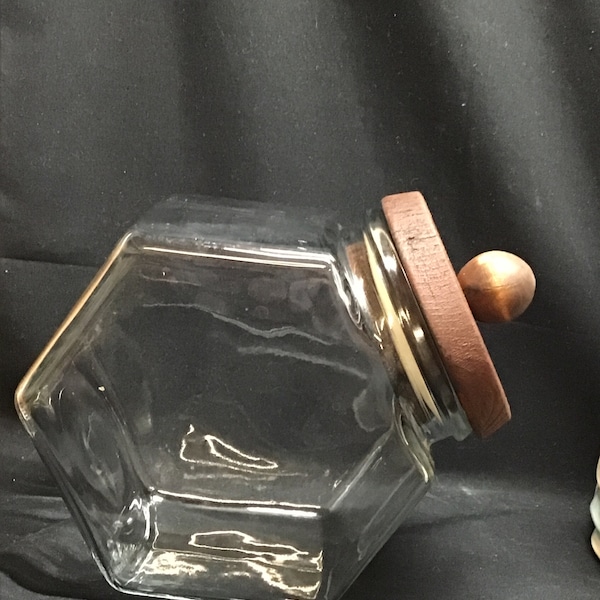 Vintage glass canister. 2 positional. Wooden tops.