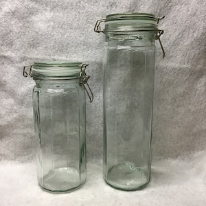 Vintage green tented glass canisters.  Set of 2. Apothecary jars