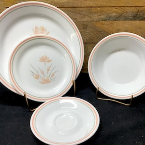 Vintage Corelle discontinued dinnerware. Lot of 24 pieces. Peach Floral Pattern.