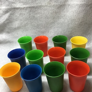 Vintage Used Tupperware tumblers . Set of 4 kid’s glasses. Number 109