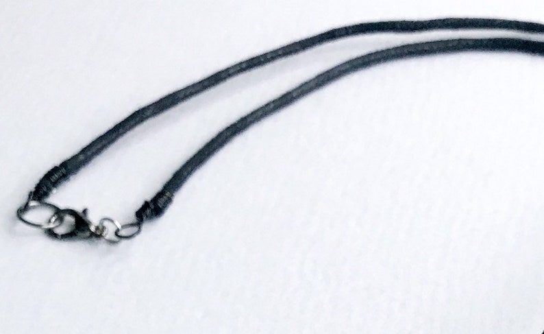 Bird Skull Necklace Unisex corded necklace with bird skull pendant