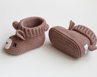 Gender neutral baby boy girl reveal ideas Pregnancy booties gift set Newborn shoes present basket Brown crochet llama farm animal soft 13/09