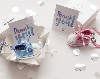Boy girl baby shower gender reveal party favor gift boxes for guests with small little cute crochet baby bootie sneaker keychain trinket