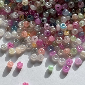 Perle di vetro Rocailles pastello, 12/0, circa 2,5 mm, colorate 10 g.