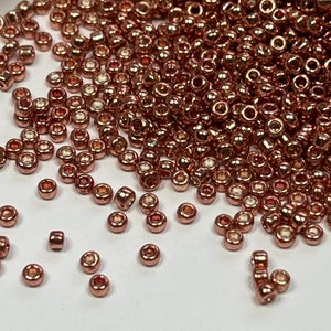 Perline di vetro in oro rosa 12/0, ca. 2,5 mm, lucentezza metallica, oro rosa, 10 g.