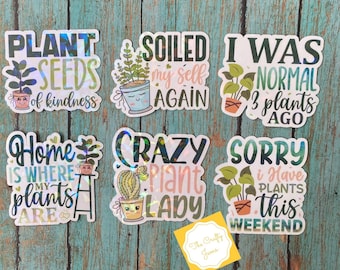 May include: Six holographic stickers with plant puns. The stickers feature illustrations of plants in pots and the text "Plant Seeds of Kindness", "Home is Where My Plants Are", "Soiled My Self Again", "I Was Normal 3 Plants Ago", "Crazy Plant Lady", and "Sorry I Have Plants This Weekend".