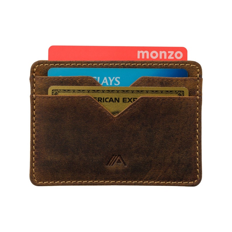 front loaded image of leather cardholder with cards inserted into the 5 available card slots