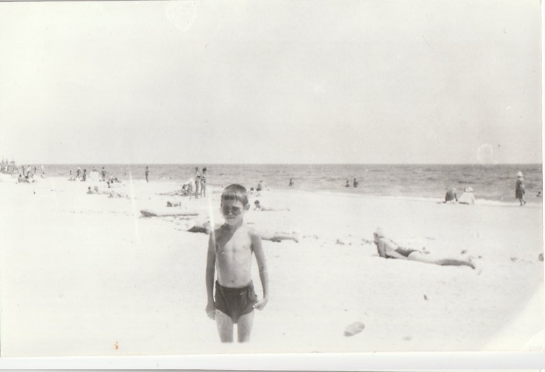 Handsome boy children on beach summer holidays snapshot vintage photo found photo