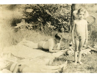 Beautiful girl children on beach summer holidays snapshot vintage photo found photo