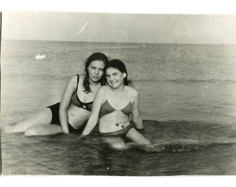 Beautiful teen girl children on beach summer holidays snapshot vintage photo found photo