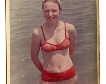 Beautiful teen girl children on beach summer holidays snapshot vintage photo found photo