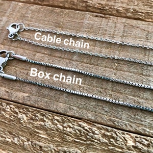 May include: Two silver chains, one labelled "Cable chain" and the other labelled "Box chain".