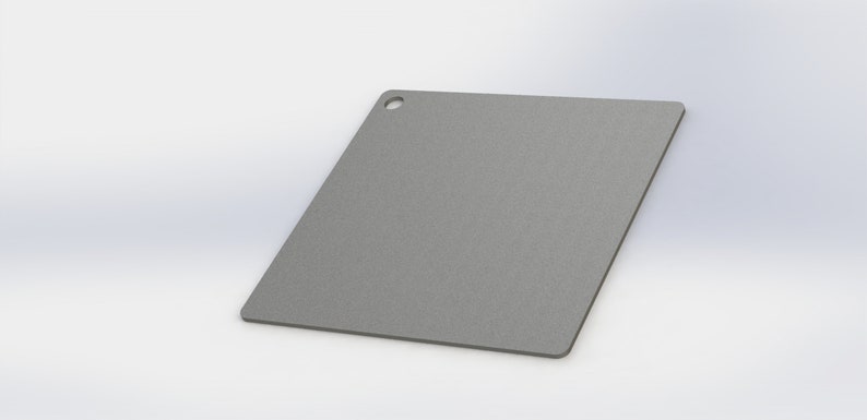 May include: A gray metal square with a small hole in the top corner.