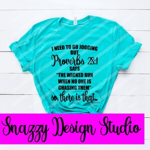 May include: A turquoise t-shirt with rolled-up sleeves. The shirt features black text that reads "I NEED TO GO JOGGING BUT Proverbs 28:1 SAYS 'THE WICKED RUN WHEN NO ONE IS CHASING THEM' so, there is that..." and "Snazzy Design Studio".