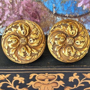 May include: A handmade wooden sign with the text "Welcome" in a playful font. The sign features a distressed white background and a dark brown border, perfect for a front door or entryway.