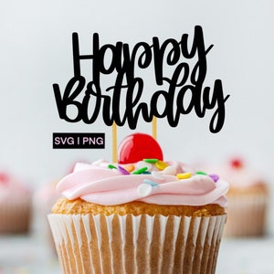 Puede incluir: Un cupcake rosa con chispas de colores y una cereza en la parte superior. Un adorno negro de "Feliz cumplea&ntilde;os" est&aacute; insertado en el cupcake.