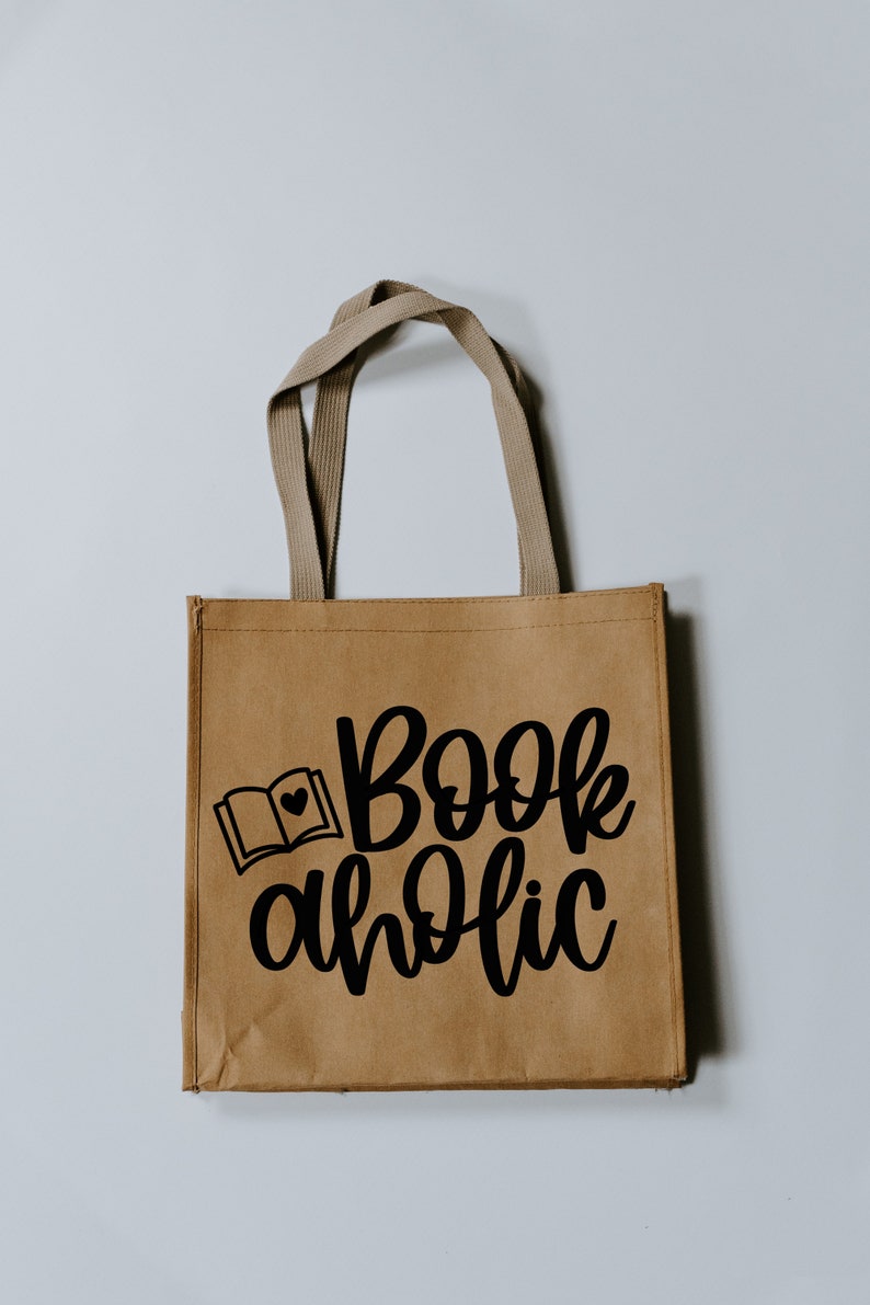 May include: A brown paper tote bag with black handles and the text "Bookaholic" with a small book and heart graphic.