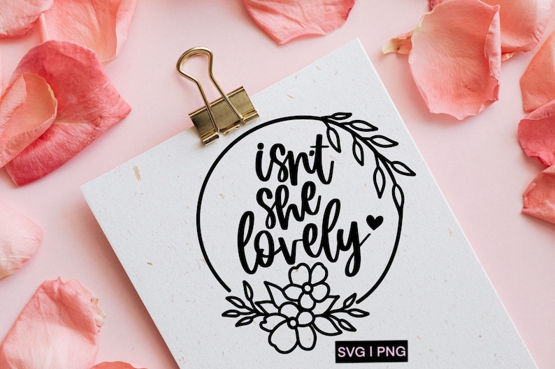 May include: A black and white graphic design with a floral wreath and the text "isn't she lovely" with a small heart.