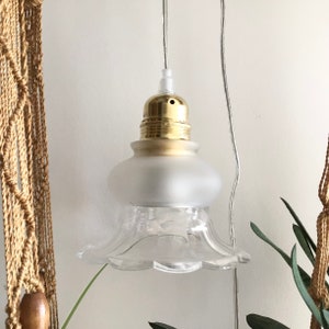 Alte Wanderlampe aus transparentem Glas