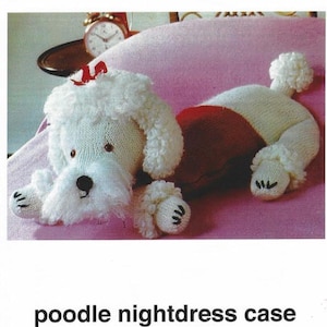 May include: A handmade white poodle nightdress case with red accents. The poodle has a fluffy head, ears, and tail, with a red bow on its head. The text "poodle nightdress case" is at the bottom of the image.