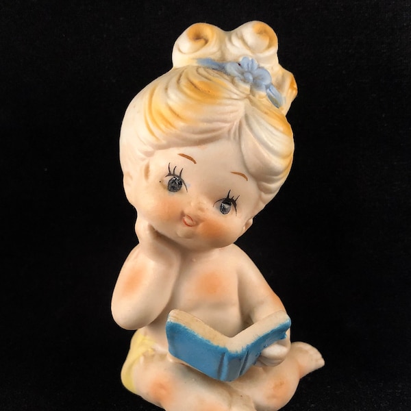 Vintage Bisque Nude Baby Girl with Book and Blue Flower Ribbon in Hair - Made in Japan - Bare Tush Baby - Retro Long Eyelash Baby Figurine