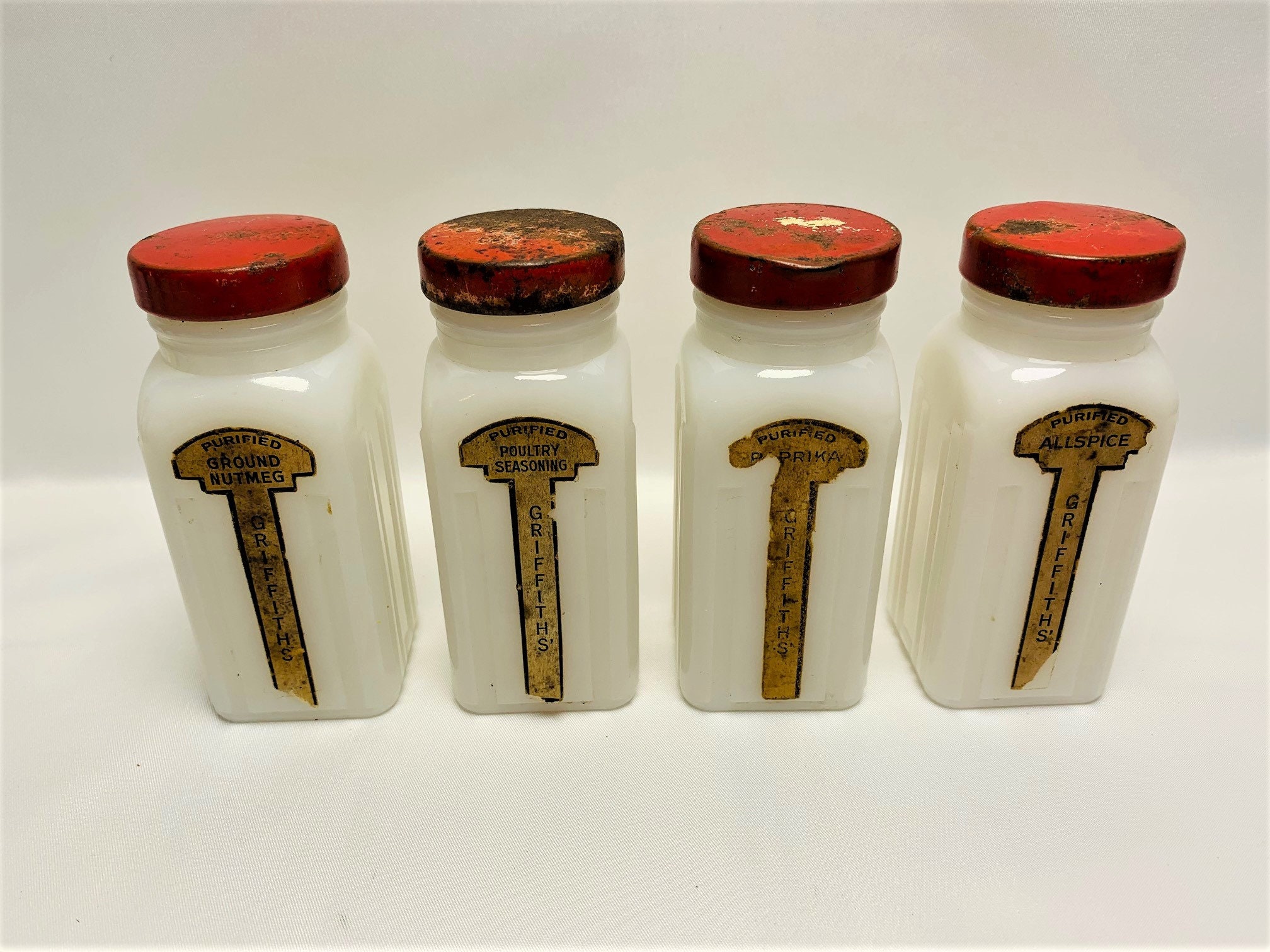 Griffiths' Red Capped Milk Glass Spice Jars With Wooden Rack