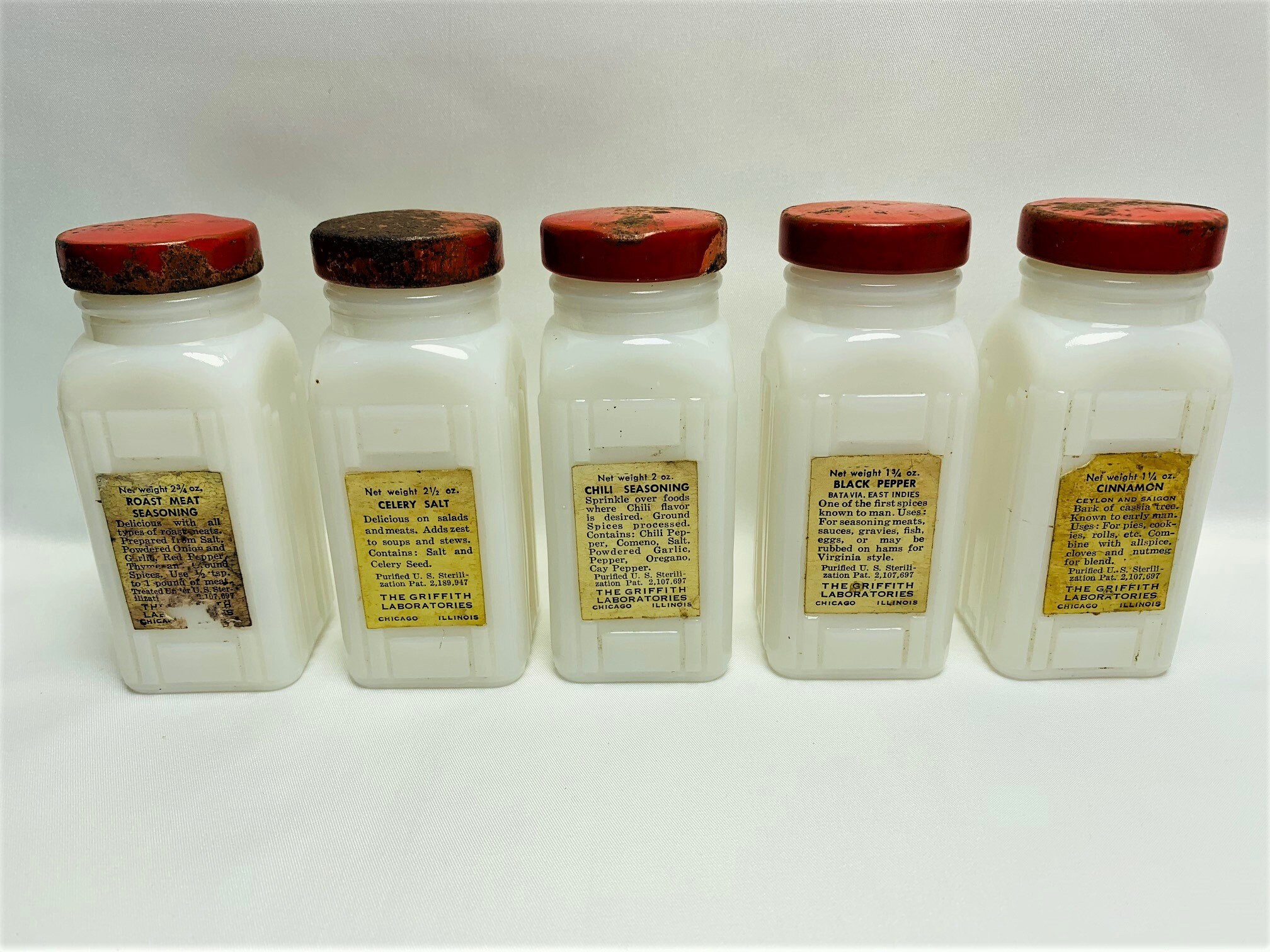 Griffiths' Red Capped Milk Glass Spice Jars With Wooden Rack