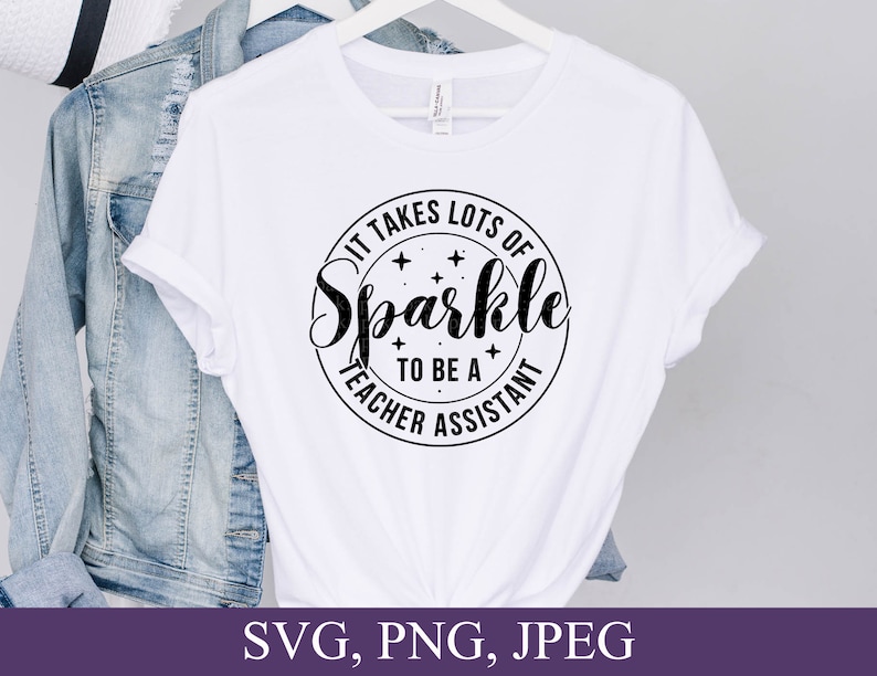 May include: White t-shirt with a black circle design that says "It takes lots of sparkle to be a teacher assistant".