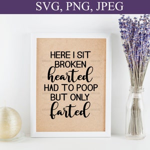 May include: A white framed print with a brown background and black text that reads "Here I sit broken hearted had to poop but only farted".