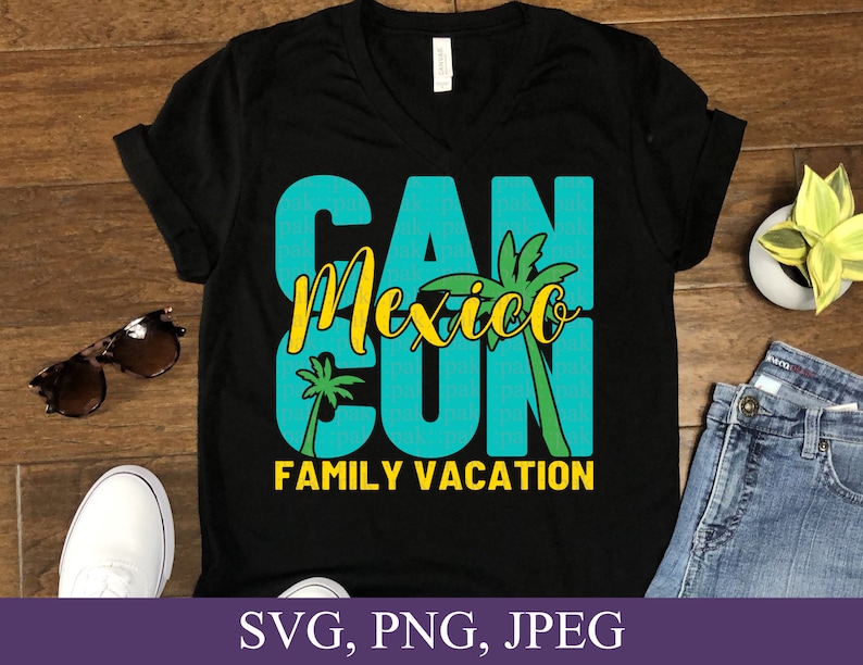 May include: Black t-shirt with a turquoise and yellow graphic that says "Cancun Mexico Family Vacation" with palm trees.
