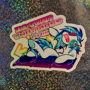 May include: A sticker featuring a cartoon pony with blue and white fur, headphones, and sunglasses, reclining on a DJ mixer. The sticker has the text "DO TURN THAT BASS UP!" in a pink and orange font, with a rainbow arrow.