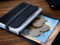 Carbon Black Leather Wallet. Personalized Minimalist Slim Card Holder with RFID Protection. product logo